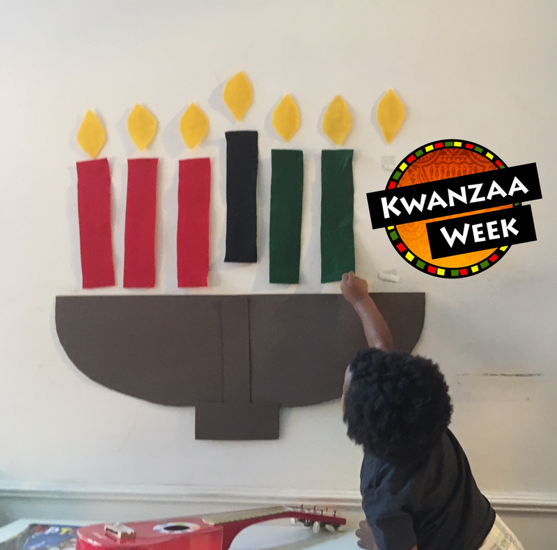 The author’s son, Garvey, celebrating Kwanzaa 2017 (courtesy of Moji Alawode-El); photo illustration by GMG/The Root